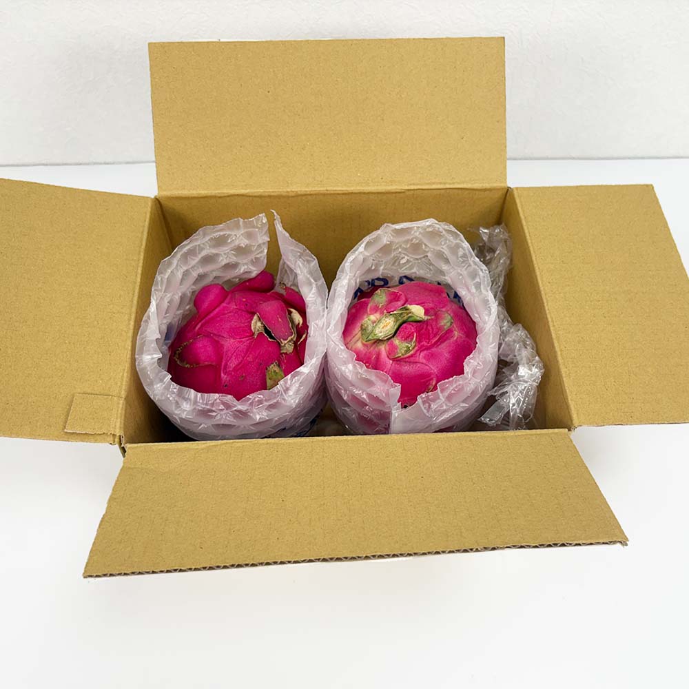 強力氣泡布包裝火龍果,防止運送過程碰撞與壓傷