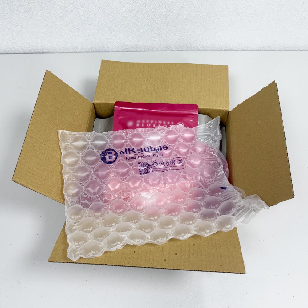 餅乾年節禮盒標準化包裝方式，採用上下鋪強力氣泡布，確保每箱緩衝品質一致