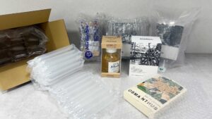 香水出貨包裝流程與緩衝包材應用示意